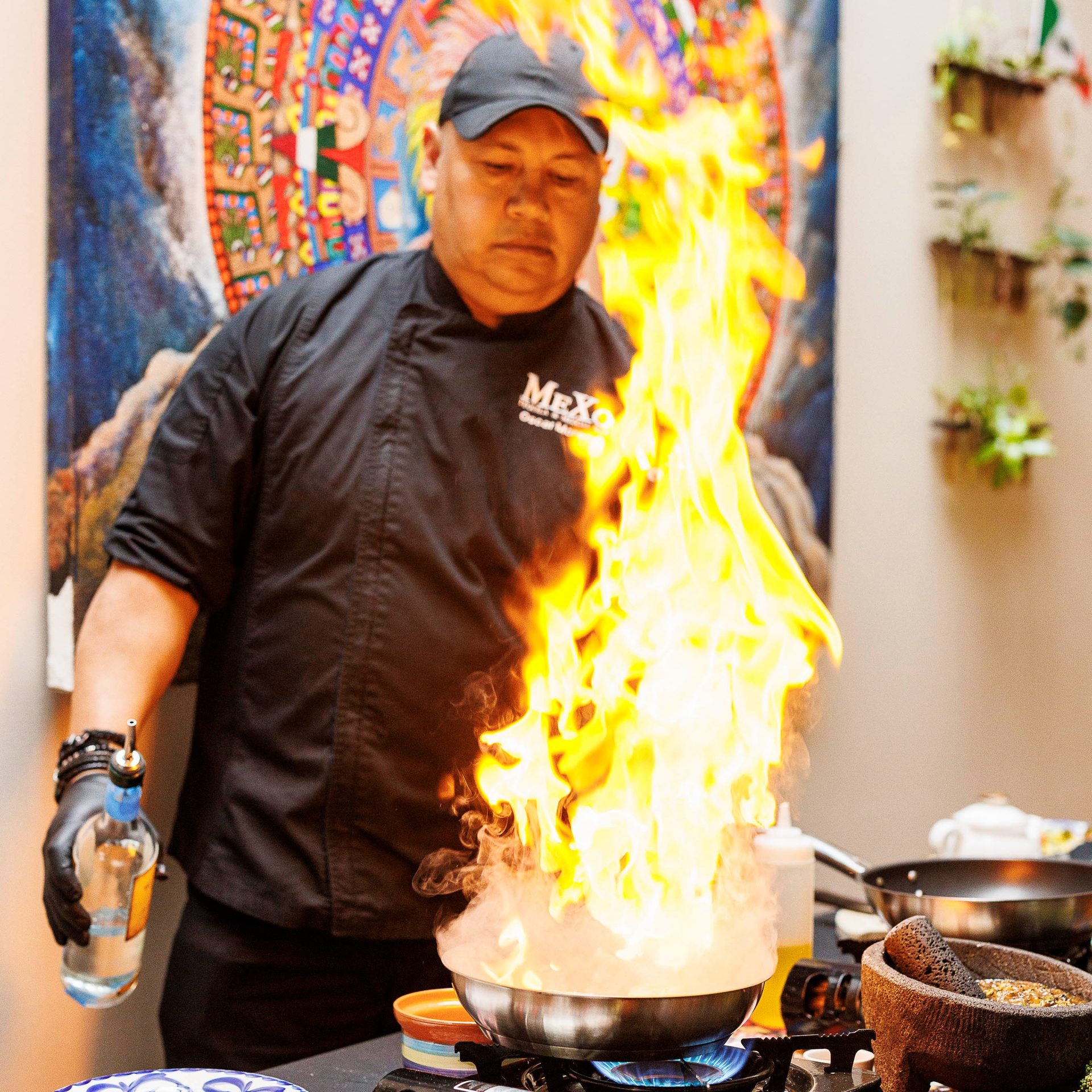 Culinary Canvas Of Fire, Smoke, And Craft
